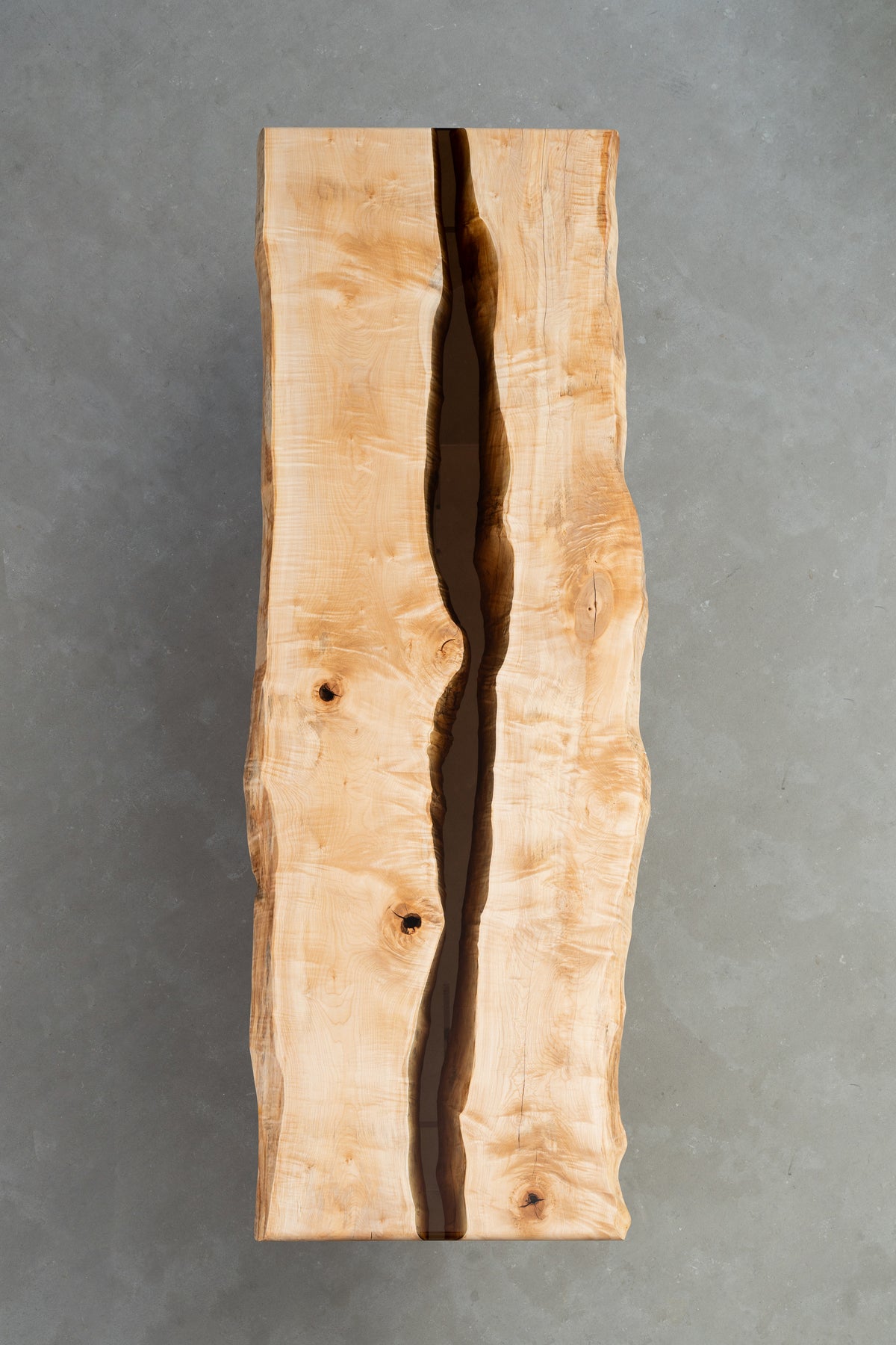 Full-length overhead view of Japanese Tochi slab showing natural symmetry and live edges by Woodslabs