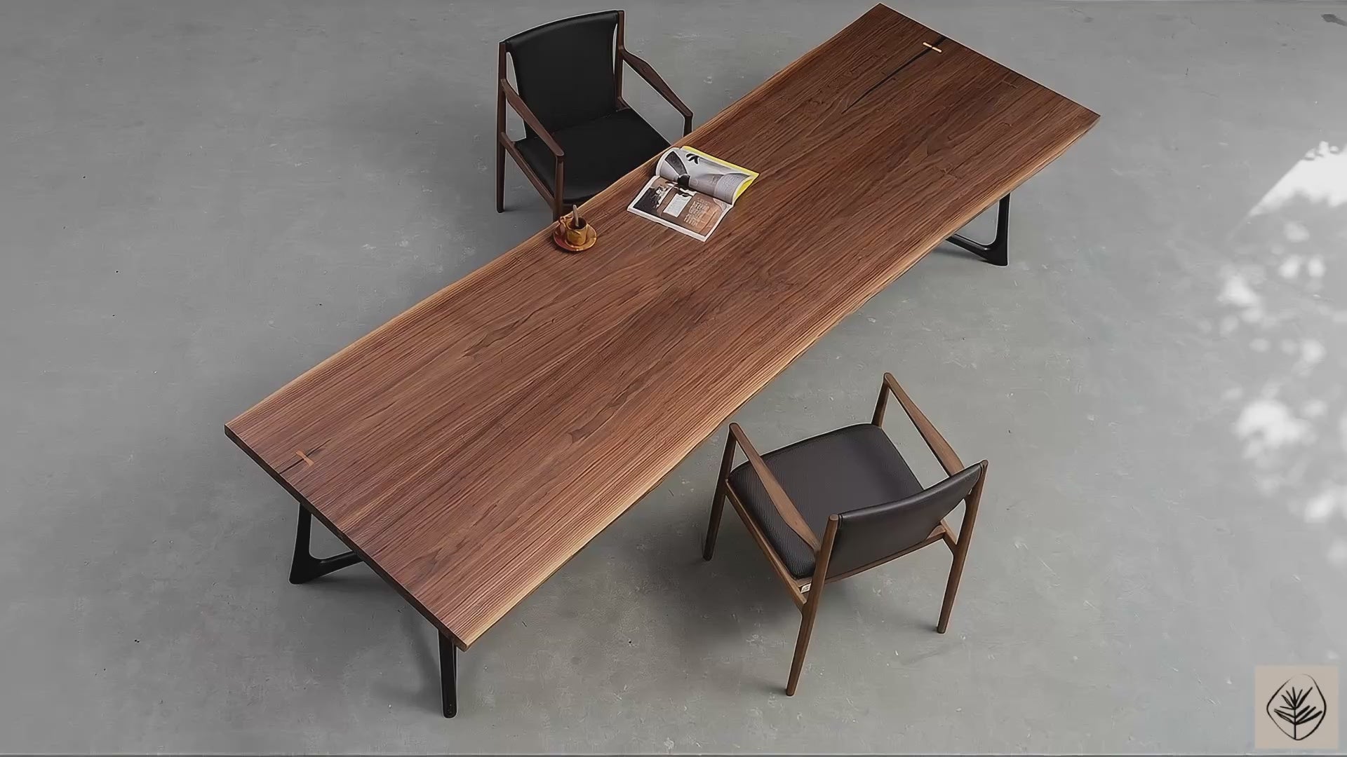 Full table overview of black walnut live edge table on wooden legs in studio setting