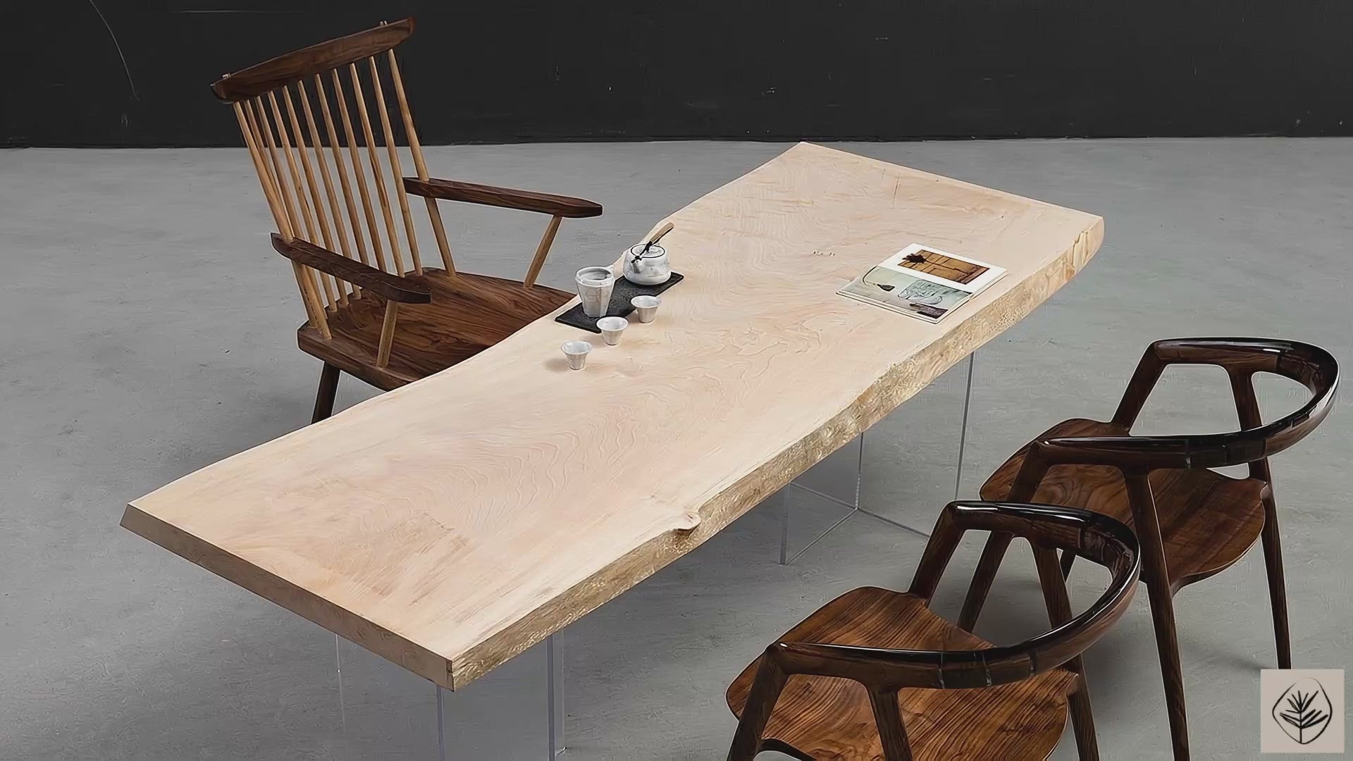 Full table overview of Tochi Veil live edge Japanese horse chestnut table on transparent resin legs in studio setting