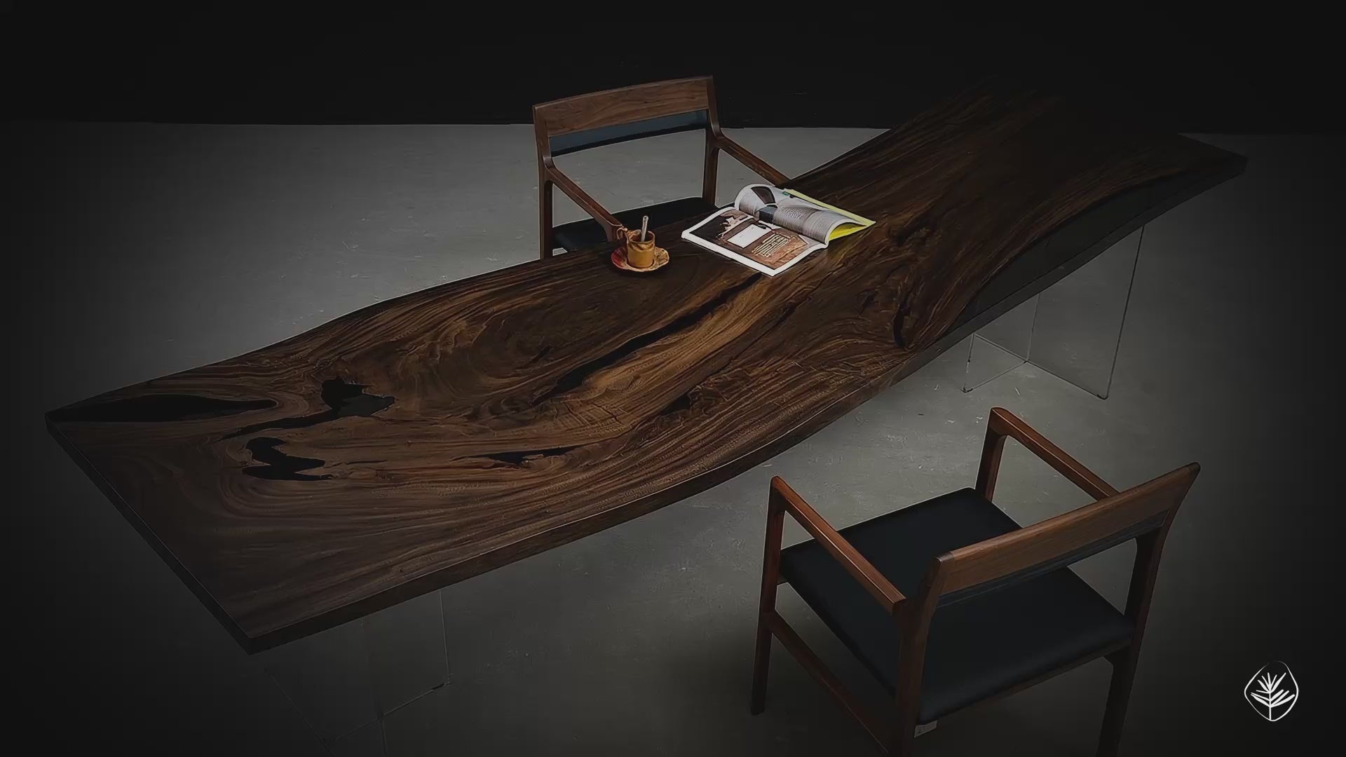 Angled overhead view of Rainfall Meridian rainwood live edge table with flowing grain and sculptural acrylic base
