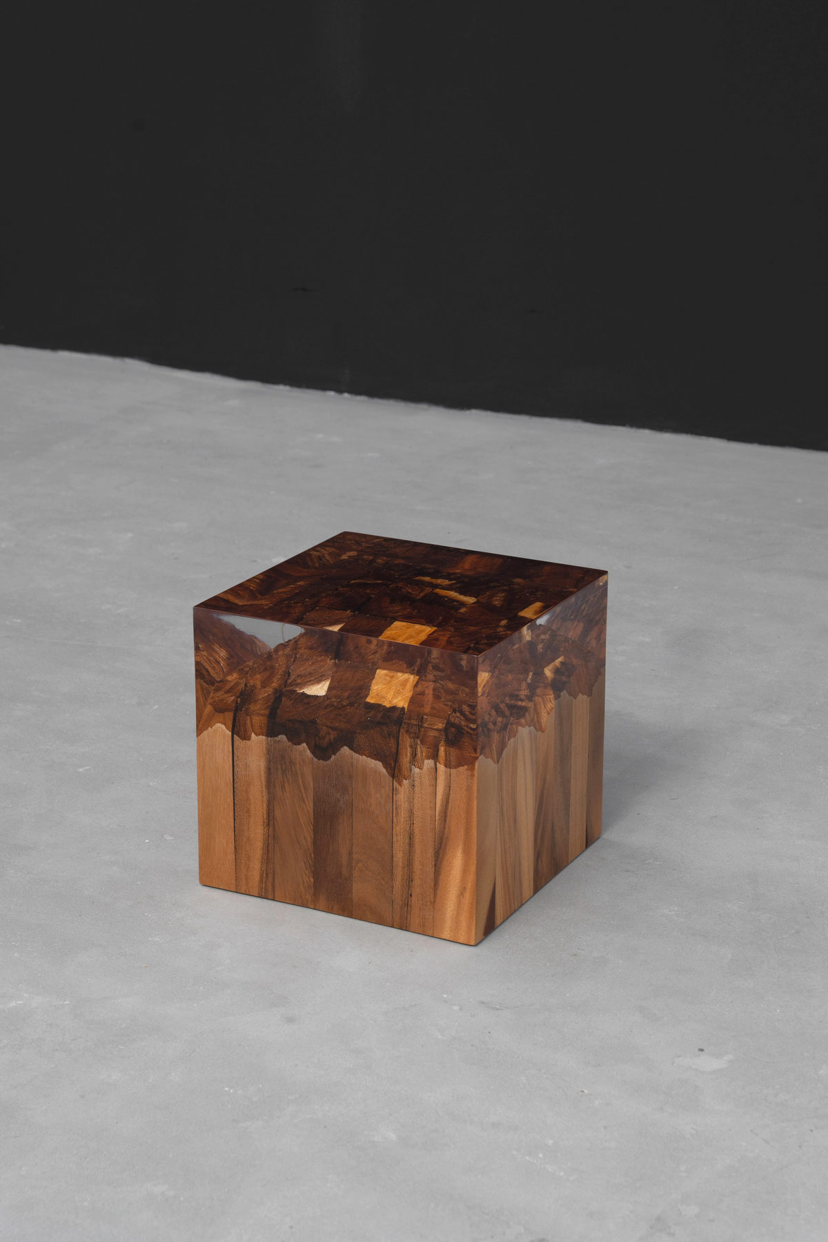 Cube of Origins rainwood root sculpture displayed against a minimalist background.