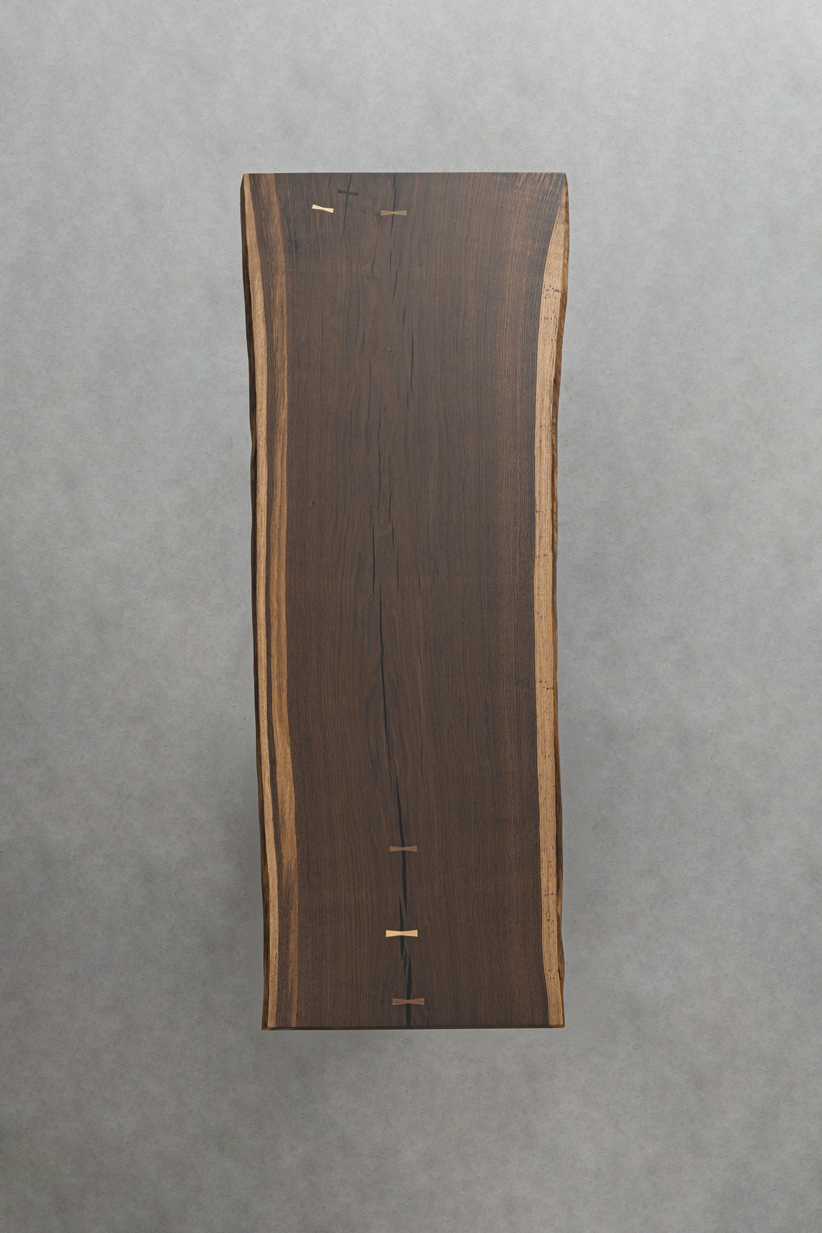 Overhead view of the Aureole Table showing the smoked white oak slab