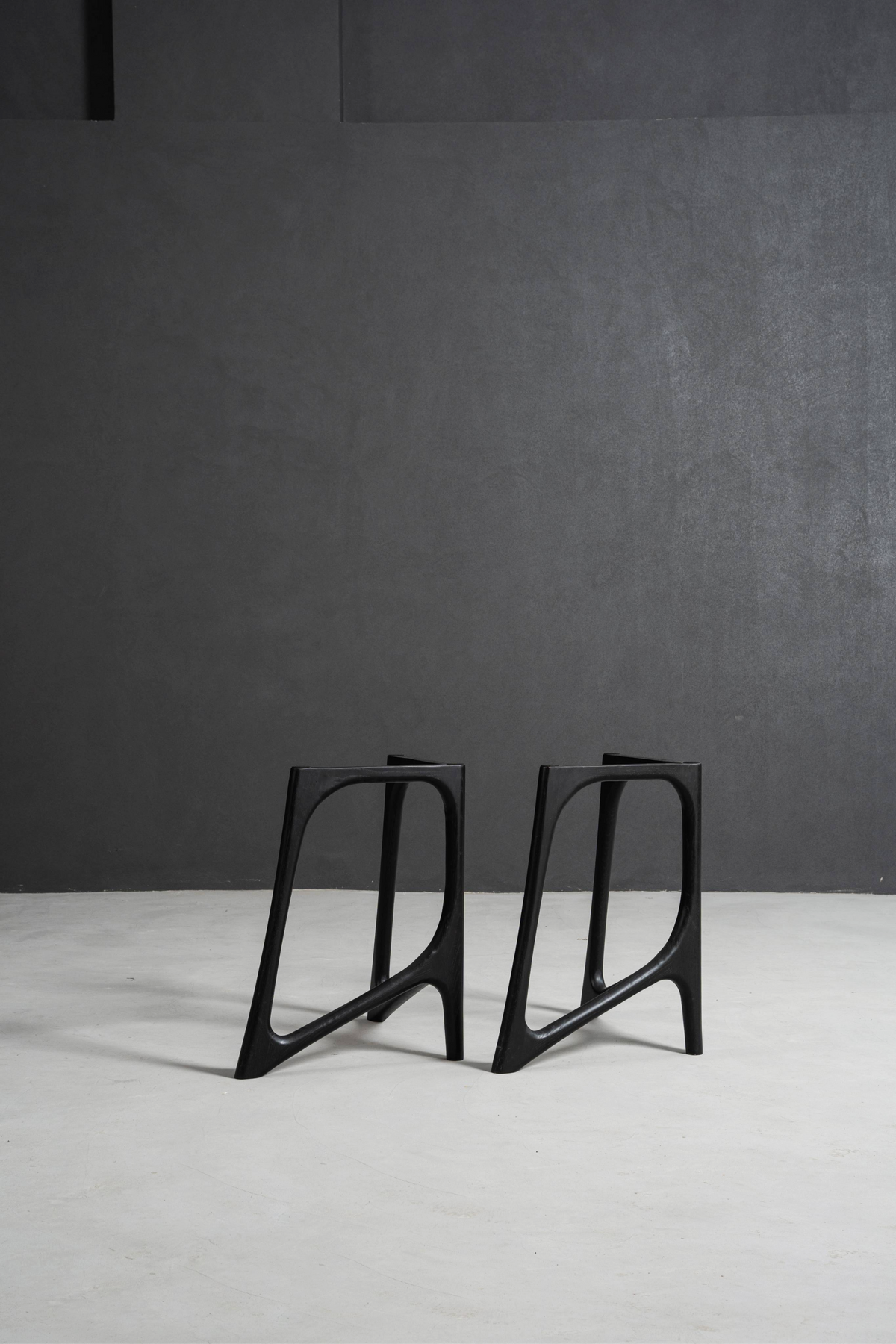 Black Butterfly Effect table stands against a minimal background.