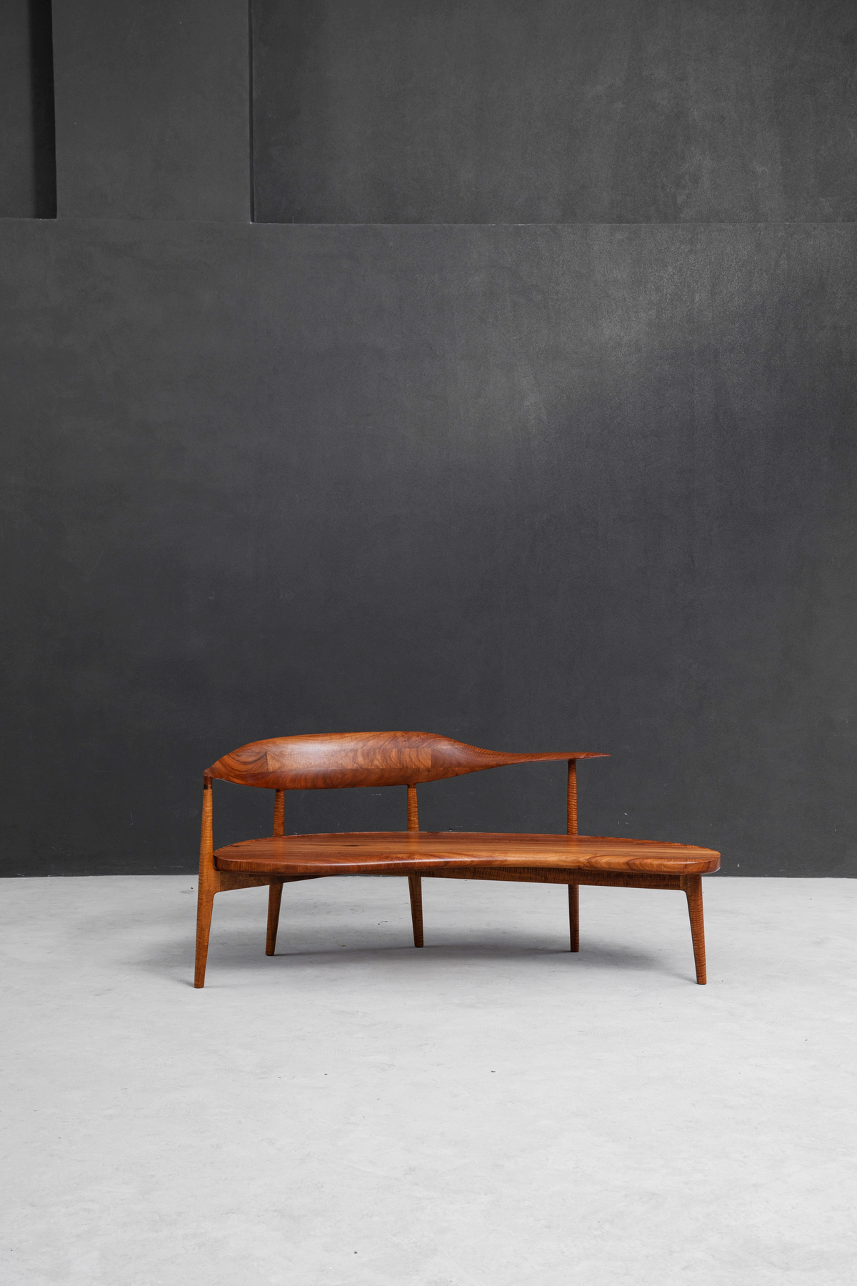 Shigeki Matsuoka-inspired Confluence Chair in Indian rosewood, full view of flowing dual-seat design.