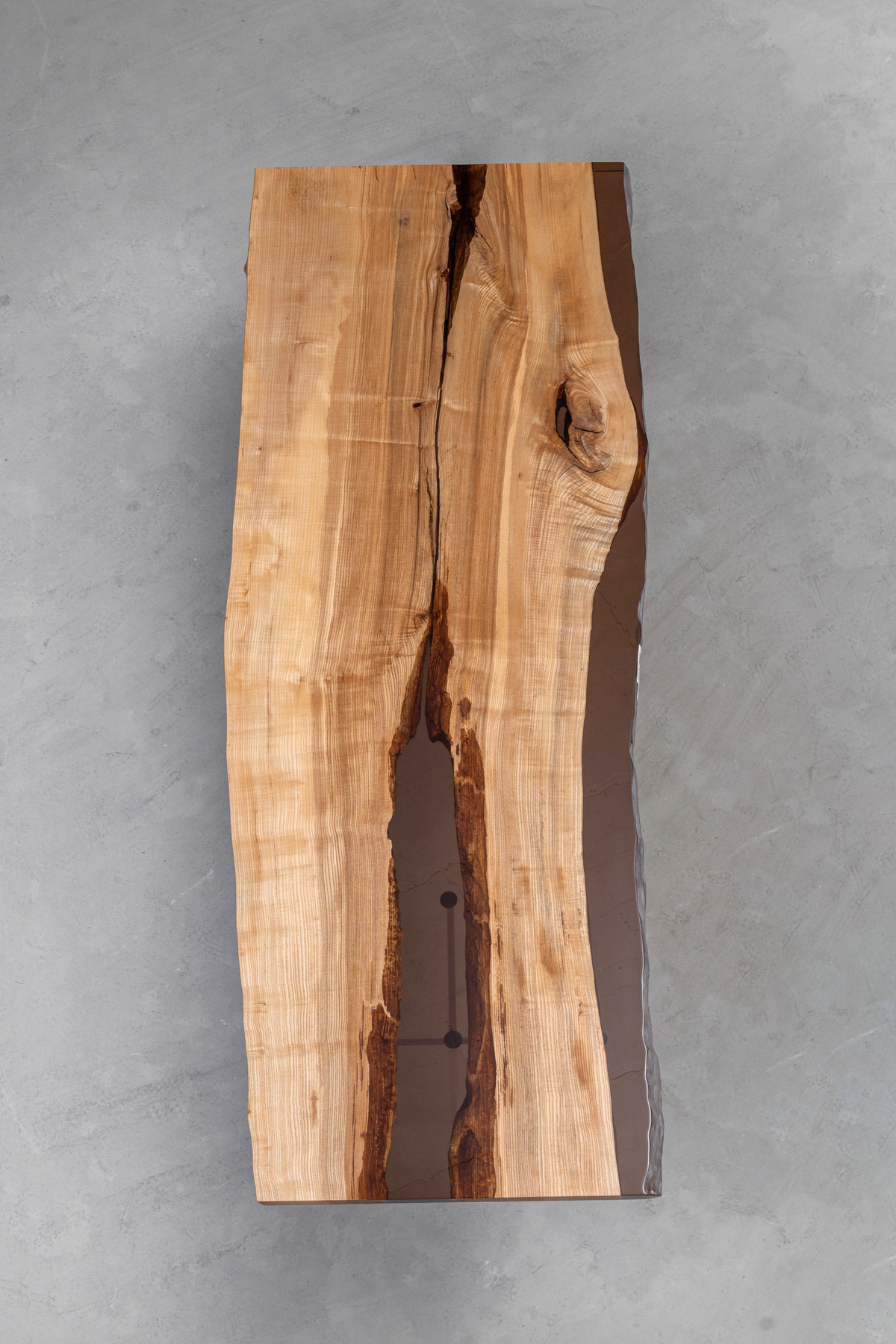 Overhead shot of Convergence Table revealing the dramatic contrast between wood and epoxy elements.