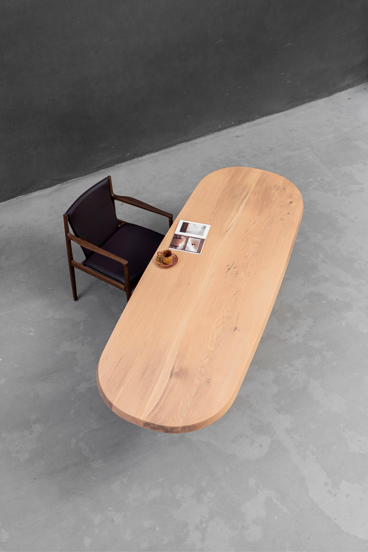 Top-down shot of Fusion Table's solid white ash slab, highlighting the wood's natural luminosity and grain.