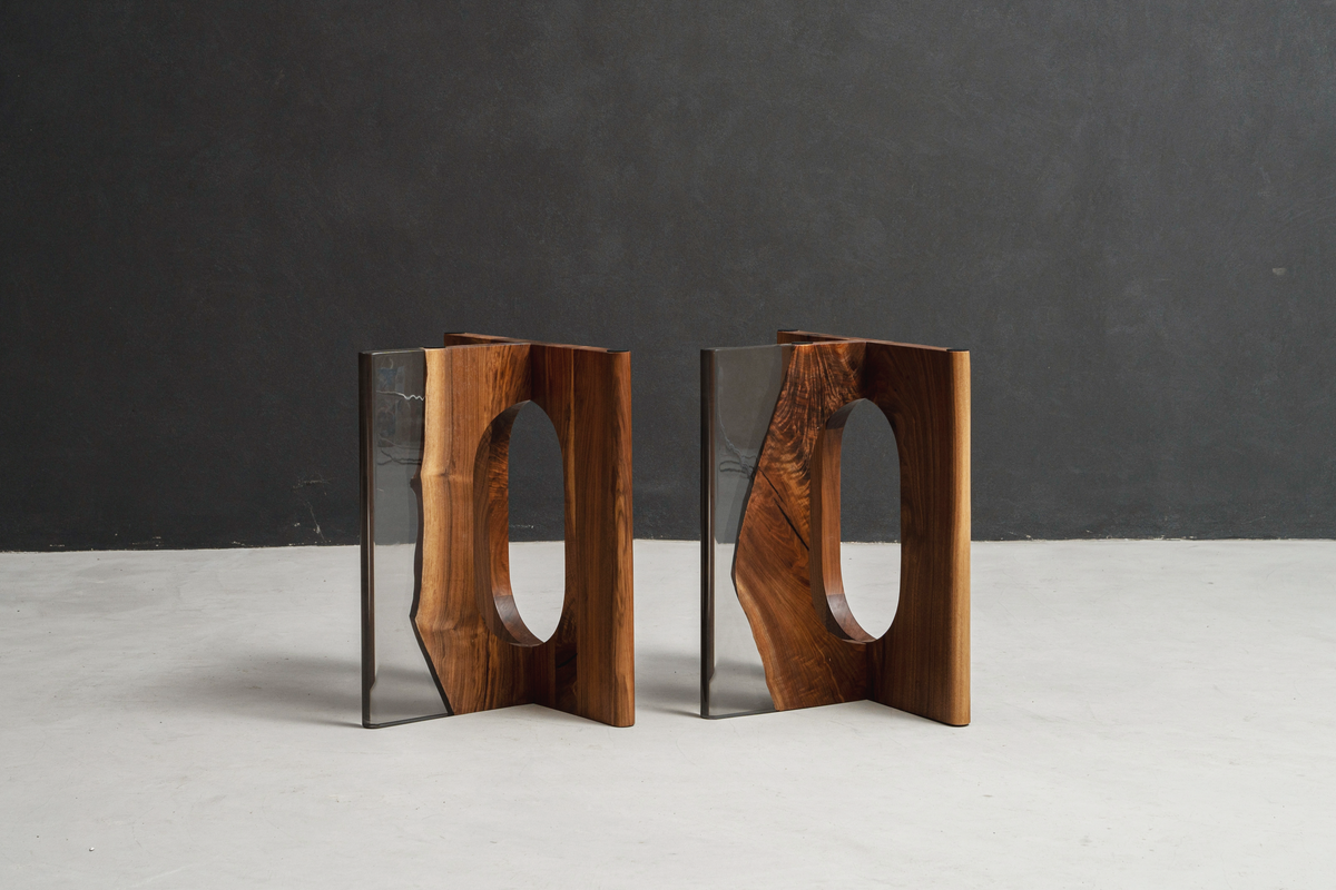Pillars of Symposium joinery with clear epoxy resin, showcasing structural artistry and modern craft.