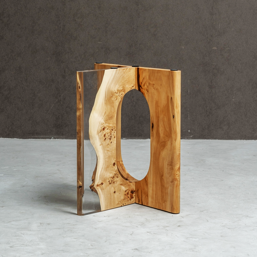 Close perspective on Pillars of Symposium featuring mappa burl's organic patterns and clear epoxy.