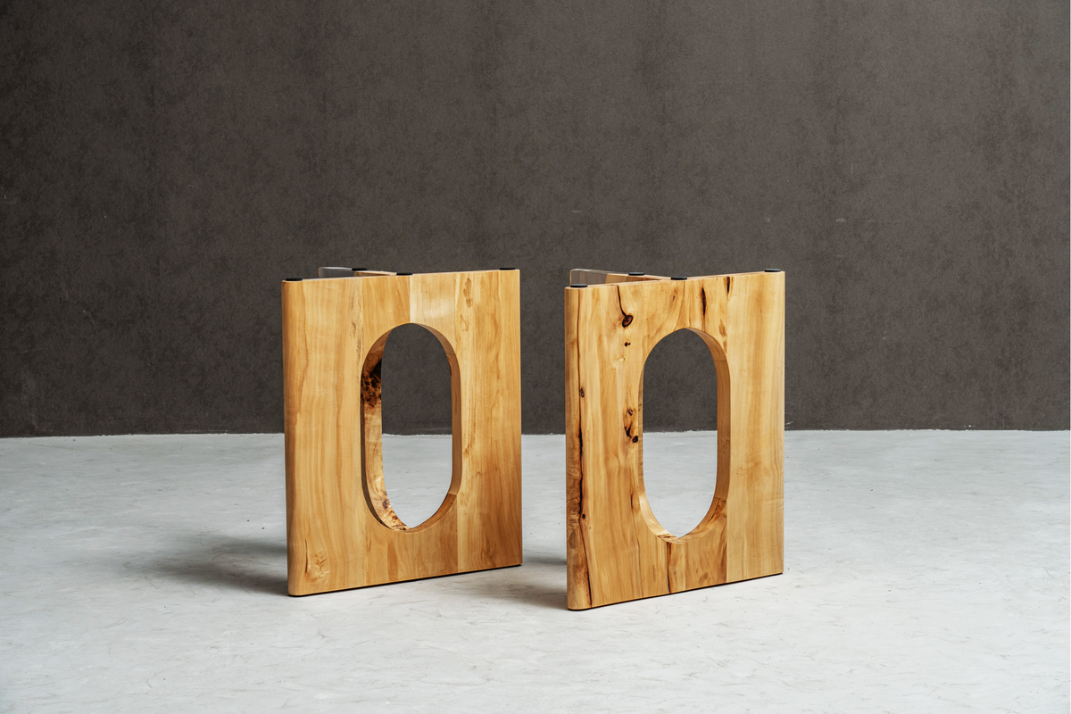 Paired Symposium base in minimalist environment, showcasing poplar wood with epoxy resin details.