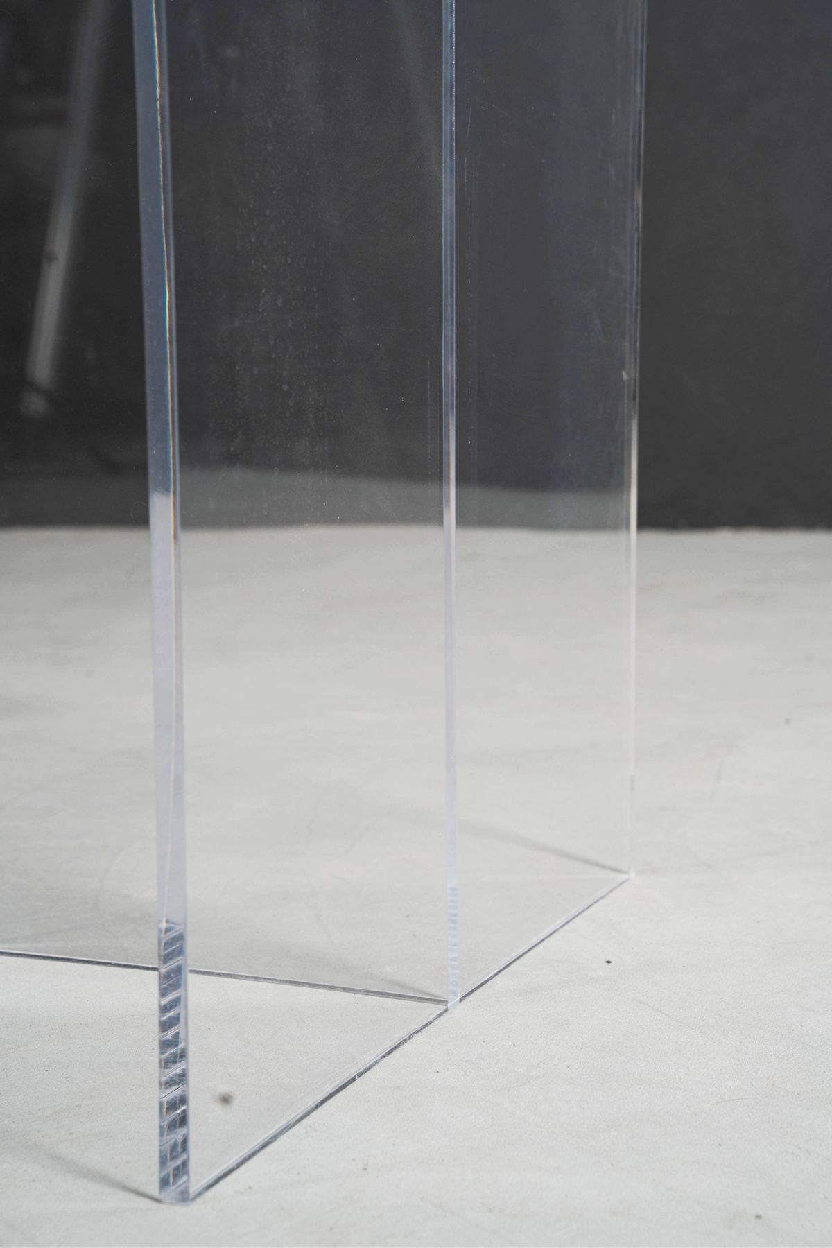 Close-up of the Silent T base's floor connection point, revealing the precise engineering that ensures table stability.