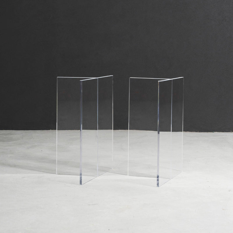 Silent T-Base acrylic table stand featuring a clear structural form and minimal architectural support