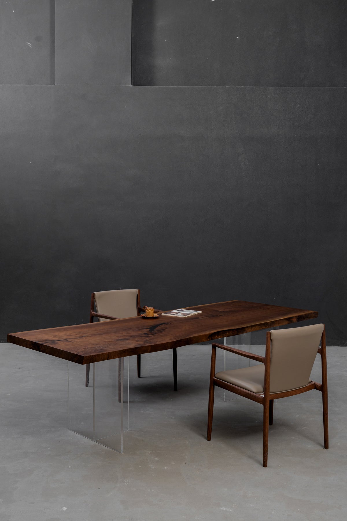 Angled view of Span of Influence black walnut table highlighting grain flow and sculptural form by woodslabs