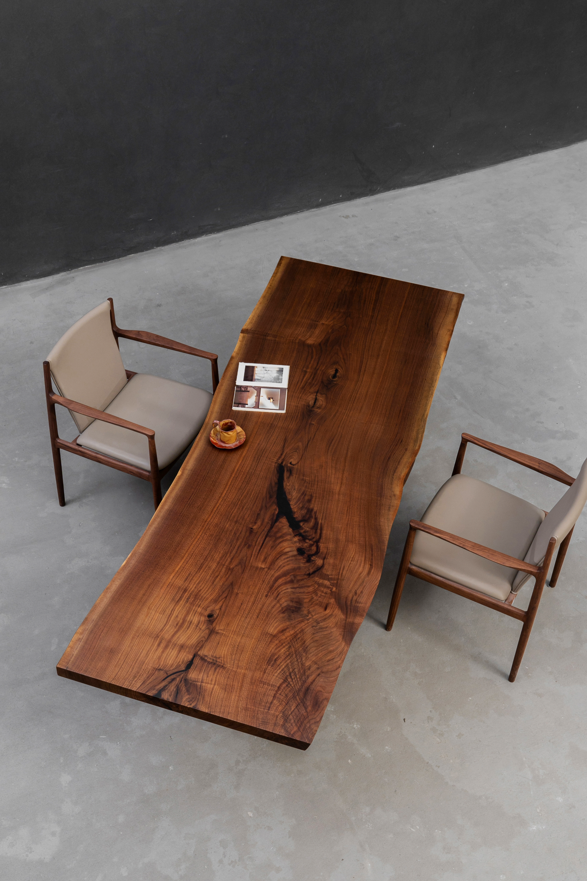 Span of Influence black walnut table by woodslabs with sculptural solid wood top and architectural presence