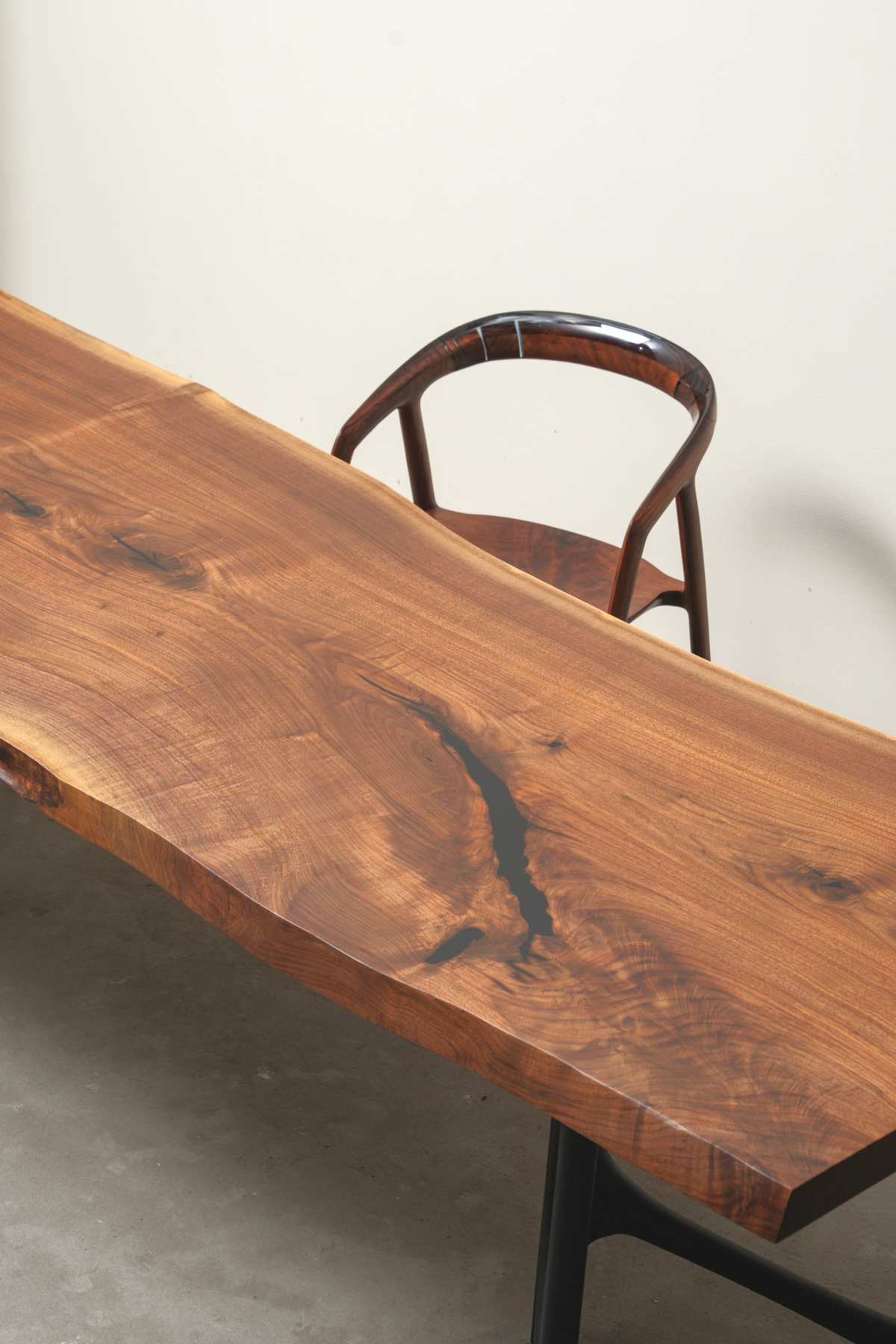 Overhead perspective showing the Span of Influence Table's scale with chair and butterfly base visible.