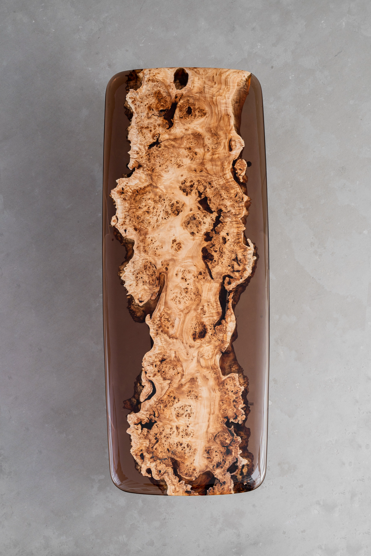 Aerial view showcasing the premium mappa burl and crystalline epoxy resin of the Synthesis Table.