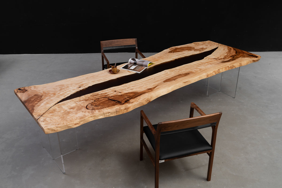 Angled wide view of Tochi Horizon Japanese horse chestnut dining table emphasising length and live-edge contours