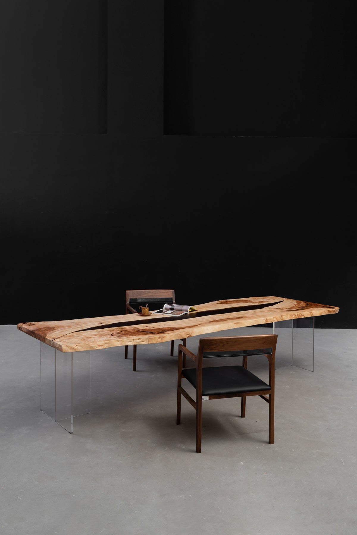 Angled portrait view of Tochi Horizon Japanese horse chestnut dining table emphasising length and live-edge contours.