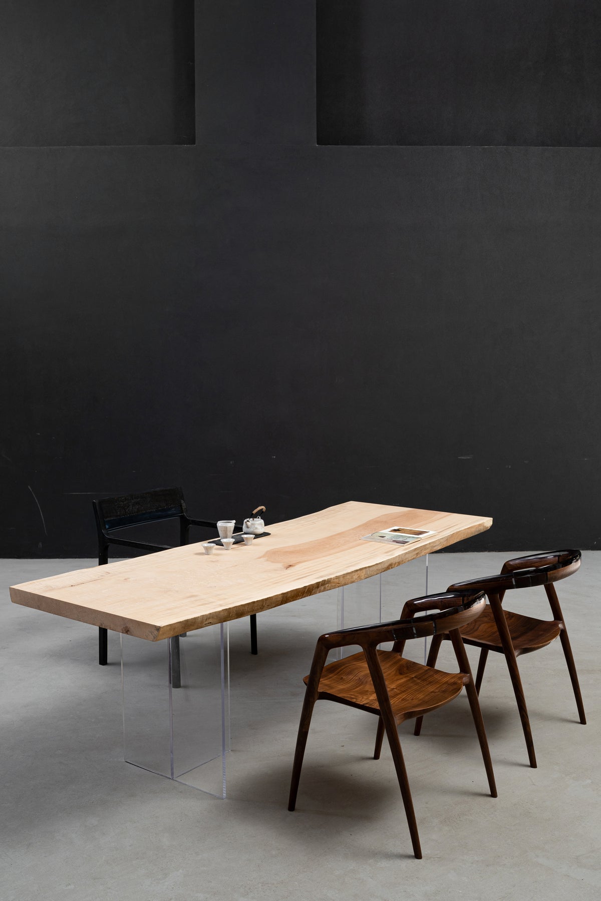 Portrait view luxury Tochi Kodama Japanese horse chestnut dining table showcasing live edge and refined surface.