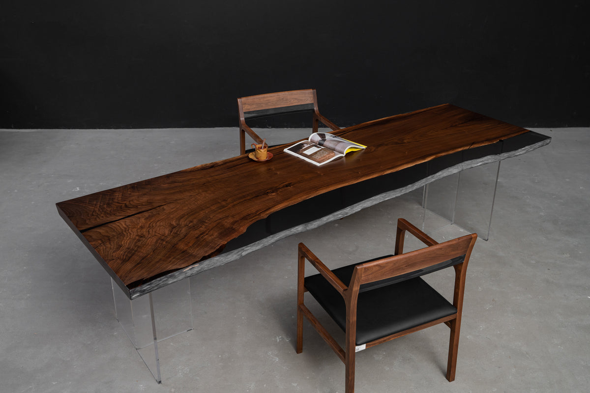 Duskwood Midnight sculptural wood table featuring a dark refined surface, strong linear form, and architectural presence